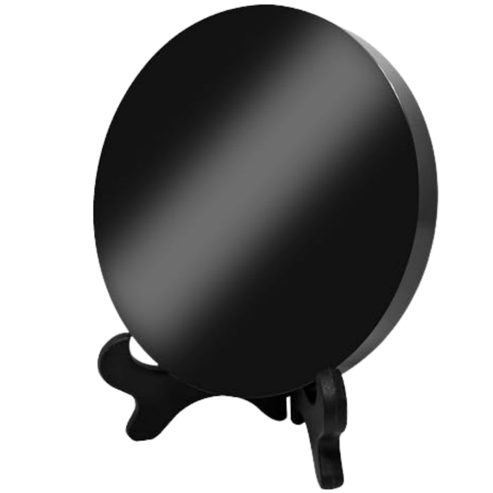 A close-up view of the Obsidian Mirror Mystic Crystals, 7.08 in, designed for scrying and spiritual energy work.