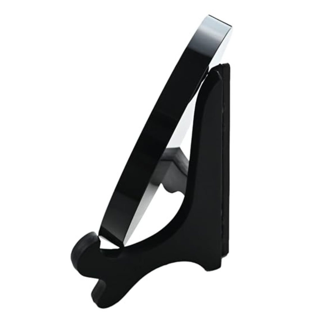 Side angle of the Scrying Mirror - Obsidian Glass (4.72 in) on its wooden stand, ideal for spiritual and decorative use.